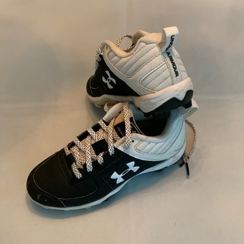Under armor kids softball or baseball cleats